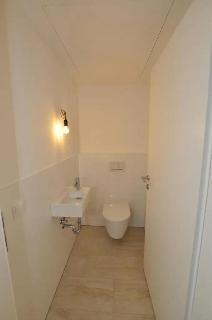 Moderne, sonnige Erdgeschoßwohnung mit Eigengarten und Tiefgarage