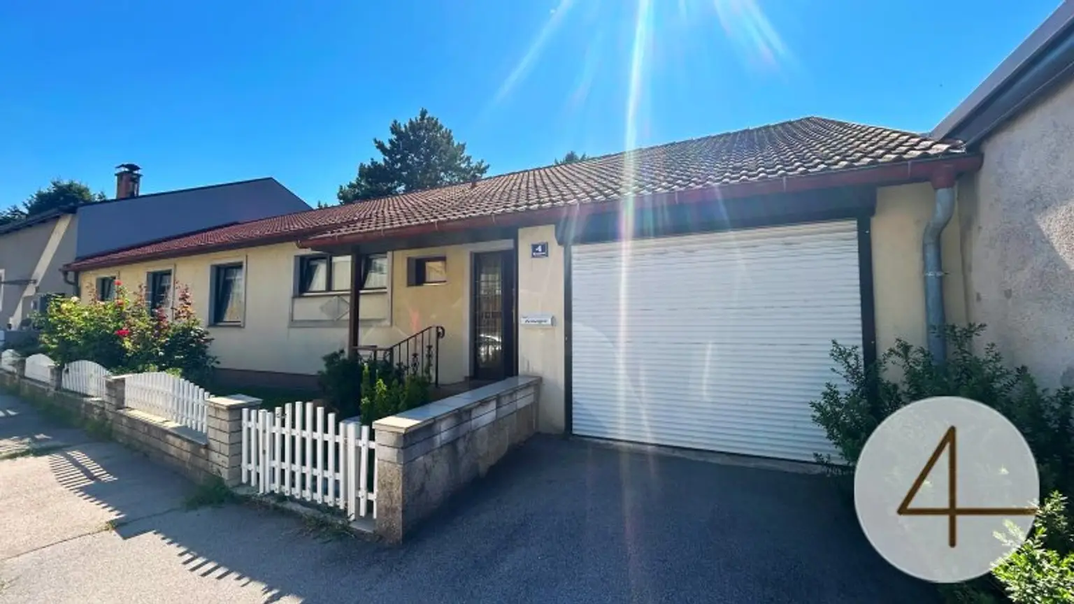 Großzügiger Bungalow mit Wintergarten und Garage im Herzen von Deutsch Wagram