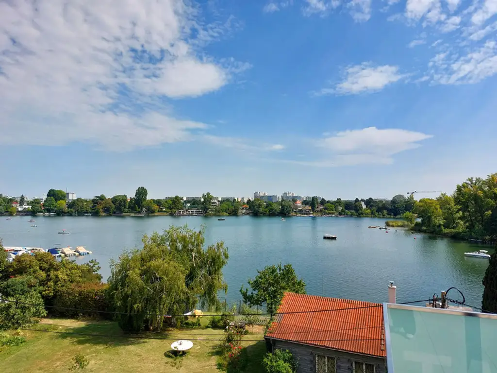 Wohnen deluxe. Prachtvolle 2-stöckige Dachgeschosswohnung mit 167 m² in absoluter Bestlage an der Alten Donau
