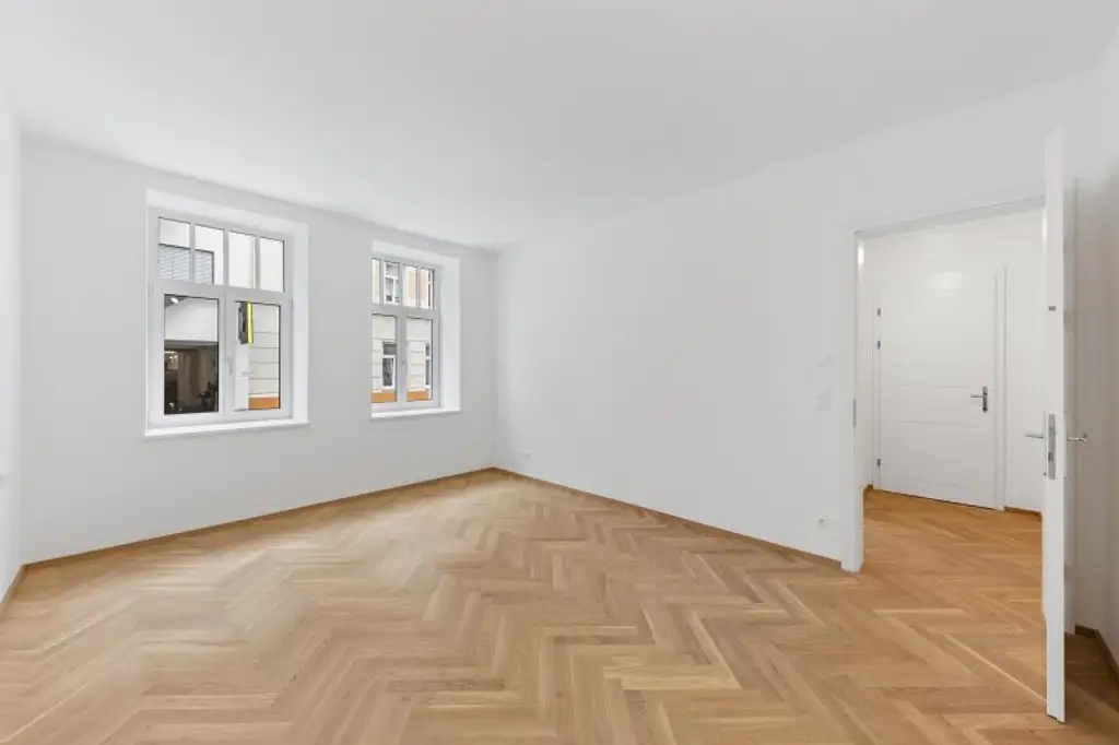 3-Zimmer-Altbaueigentumswohnung in generalsaniertem Altbau mit Terrasse und Garten