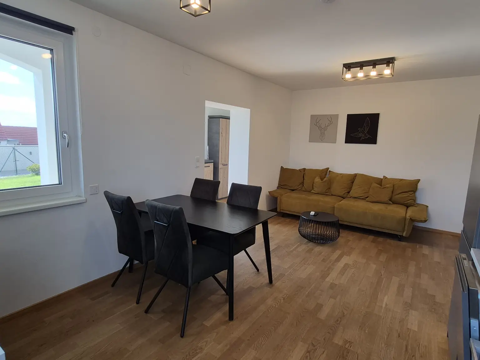 Ca. 64 m² Wohnung mit ca. 107 m² Eigengarten & Klimaanlage - Perfekt als Haupt- od. Zweitwohnsitz - Lebensqualität zwischen See und Reben