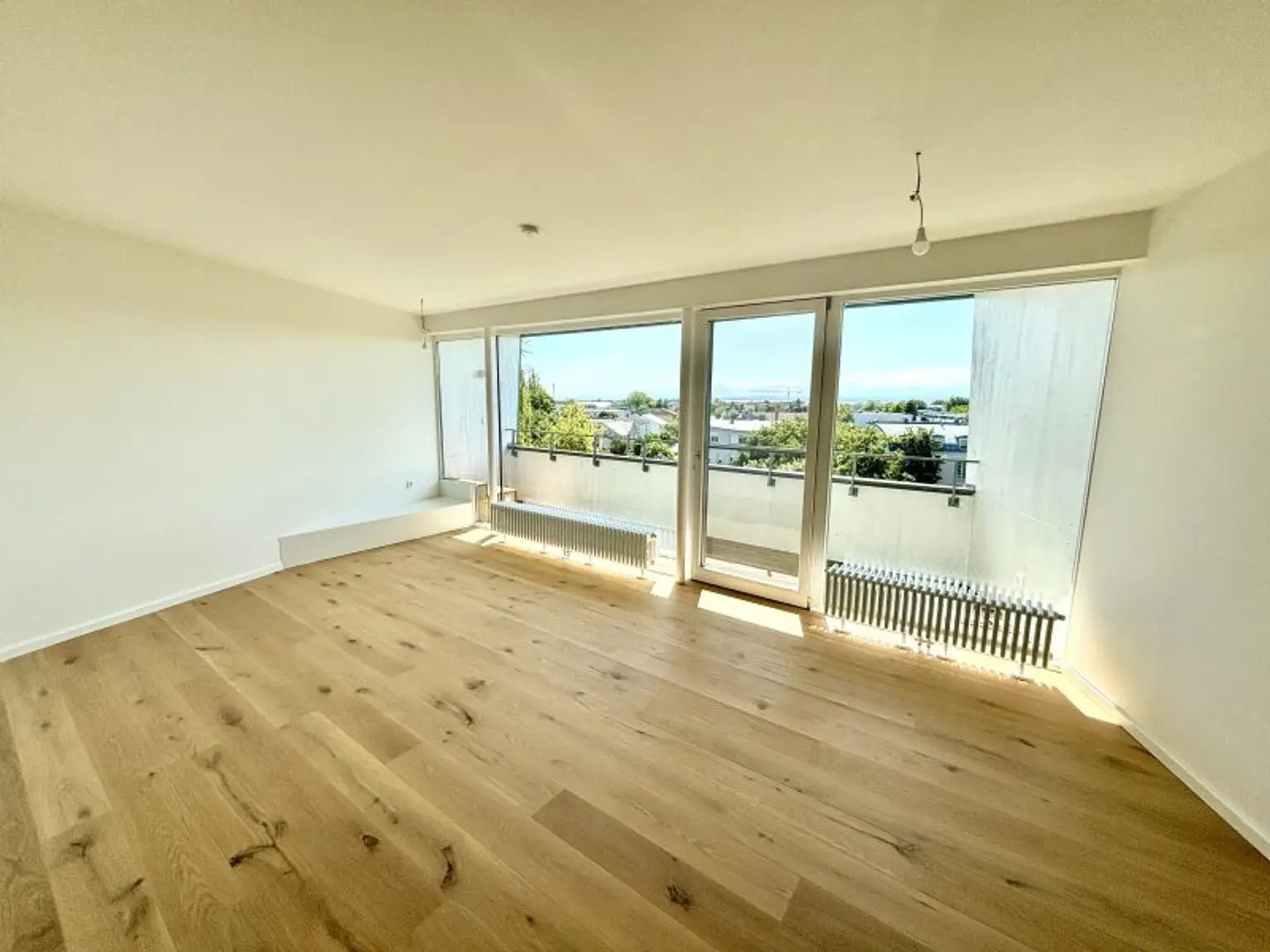 Exklusive Erstbezugs-Dachgeschosswohnung mit Loggia & Seeblick in zentraler Lage von Neusiedl