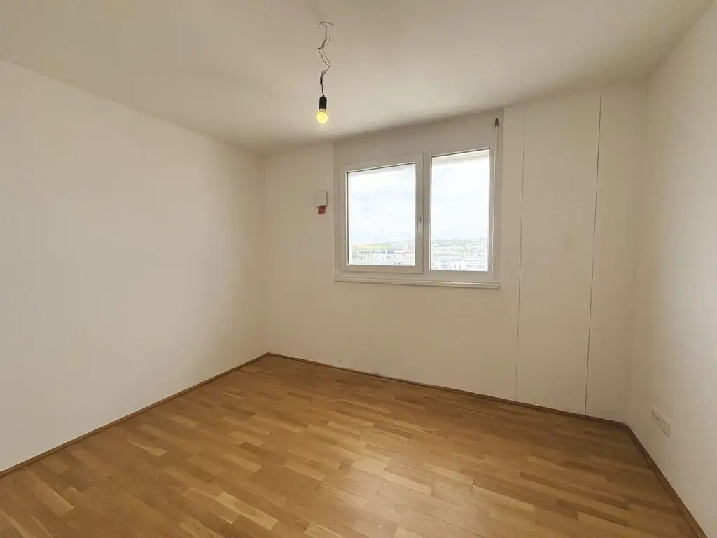 Q11 Leben in Simmering - 
3-Zimmer-Loggiawohnung mit Deckenkühlung - genießen Sie DIESEN Ausblick!