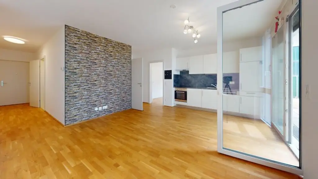Energieeffiziente 3 Zi mit Terrasse und Garten