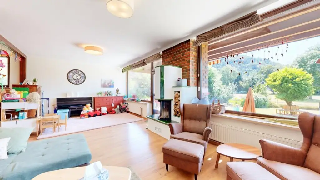 Entzückendes Einfamilienhaus mit großem Garten | 4 Zimmer | Terrasse und Balkon | Kamin
