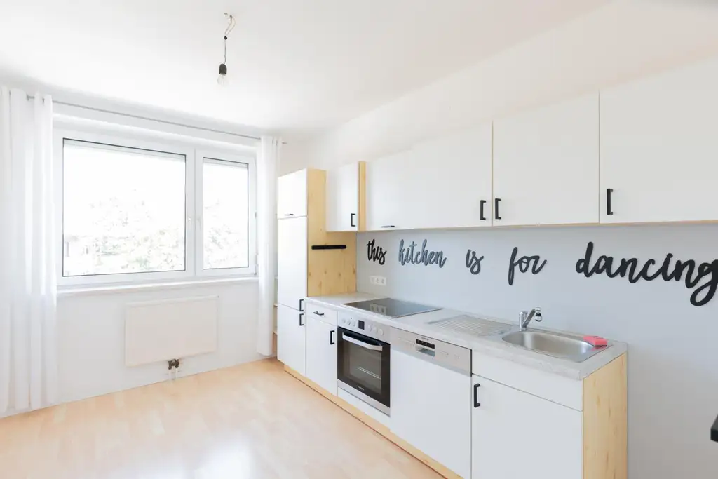 Ländlich grün und trotzdem Stadt? Diese Wohnung in Waltendorf macht's möglich!