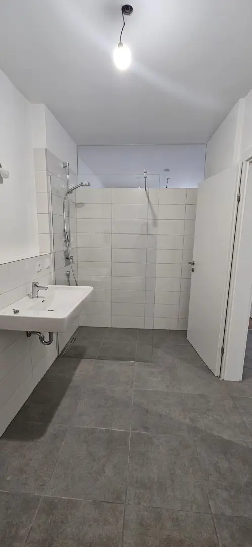 Singel oder Pärchenwohnung Stadtzentrum mit  80 m2 Garten, 11 m2 Terasse TG Platz-ERSTBEZUG