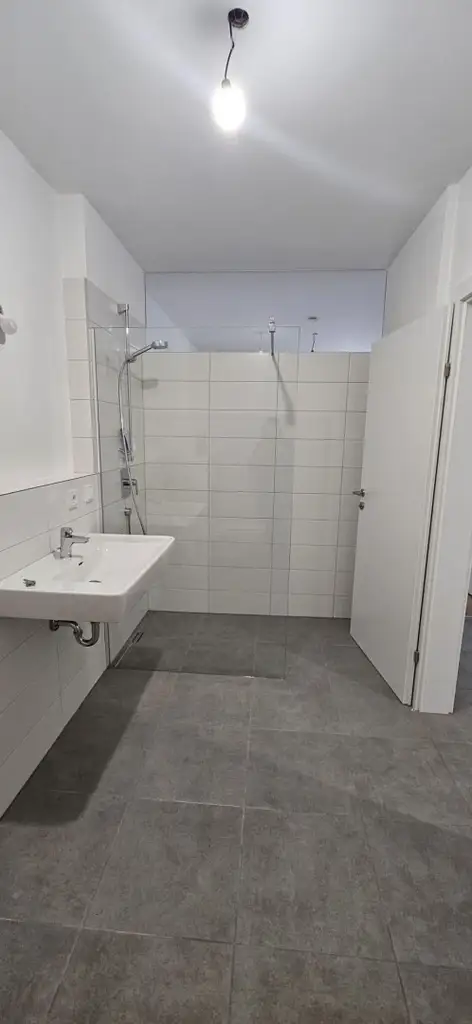 Singel oder Pärchenwohnung Stadtzentrum mit  80 m2 Garten, 11 m2 Terasse TG Platz-ERSTBEZUG