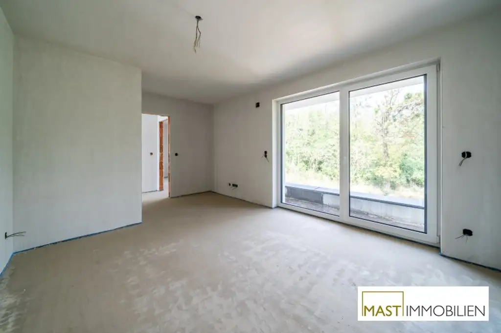 ERSTBEZUG - Modernes Einfamilienhaus mit 148 m² Wohnfläche, Balkon, Terrasse & 2 PKW-Stellplätzen in Strasshof – belagsfertig!