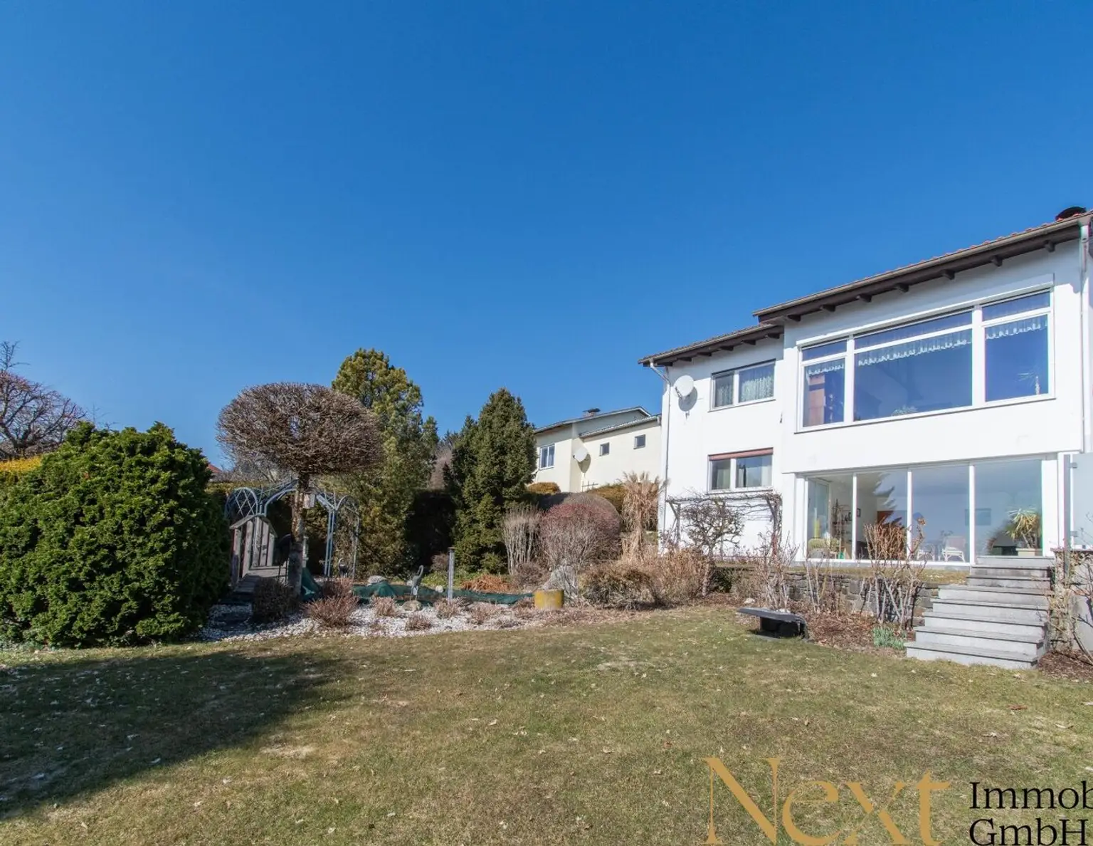Exklusives Einfamilienhaus in Altenberg (Oberbairing) bei Linz mit Einliegerwohnung, Pool und Wintergarten!