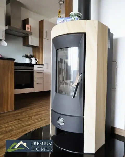 KIRCHBICHL - Eigentumswohnung - offener Wohnbereich mit Ofenwärme