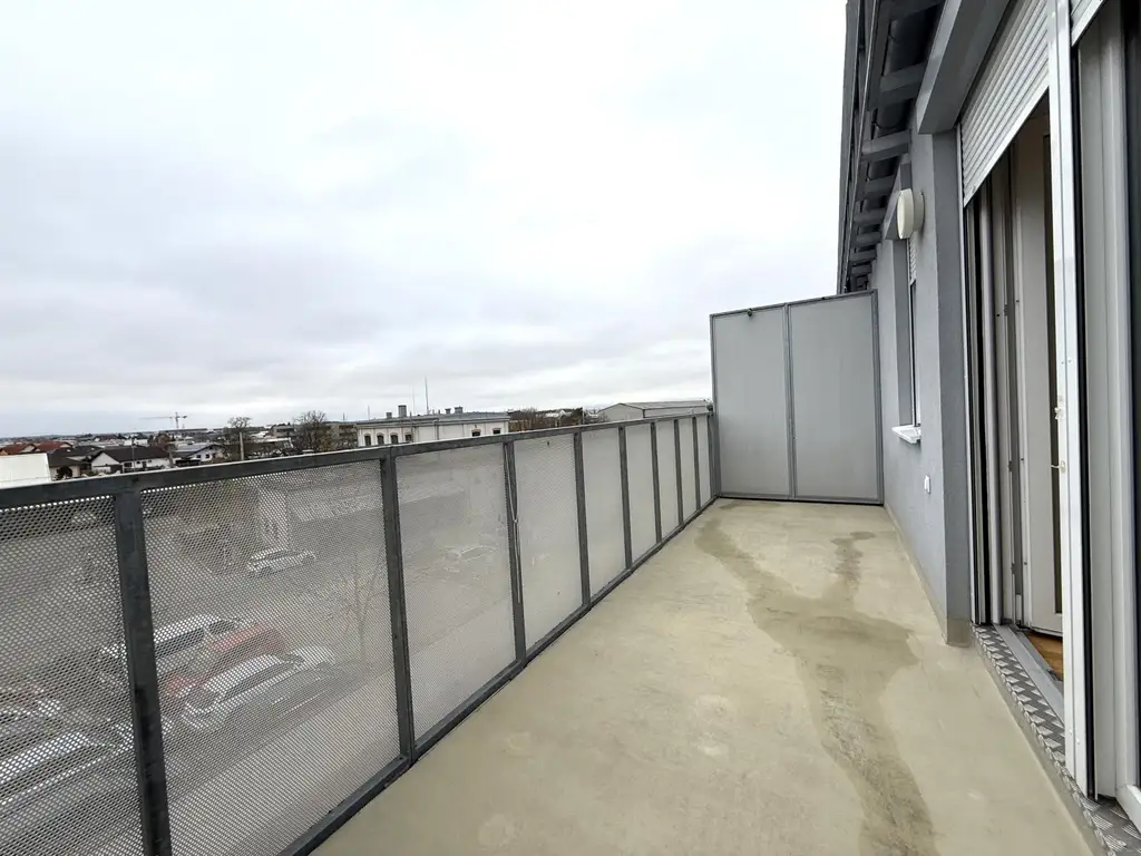 Günstige Neubauwohnung mit MEGA-SÜD-BALKON (11,77m²) nahe Akademiepark