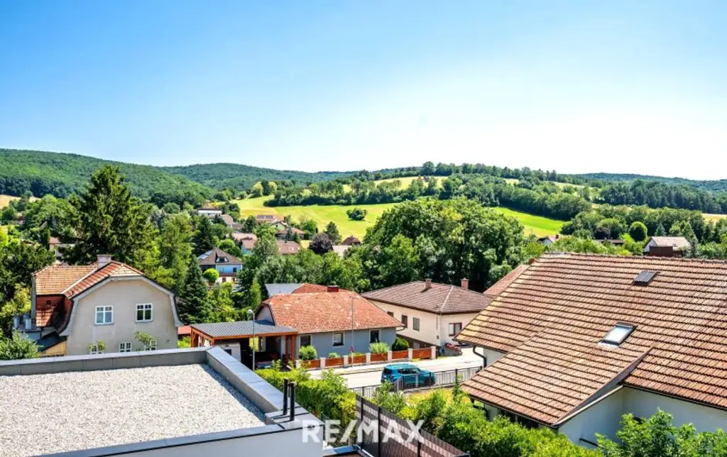Erstbezug: Großzügiger Familientraum mit unverbaubarem Grünblick!