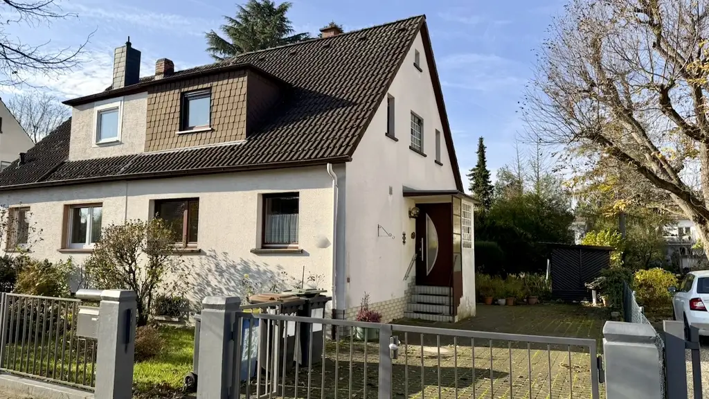 METZ IMMOBILIEN - Charmante Doppelhaushälfte mit großem Potenzial in familienfreundlicher Lage!