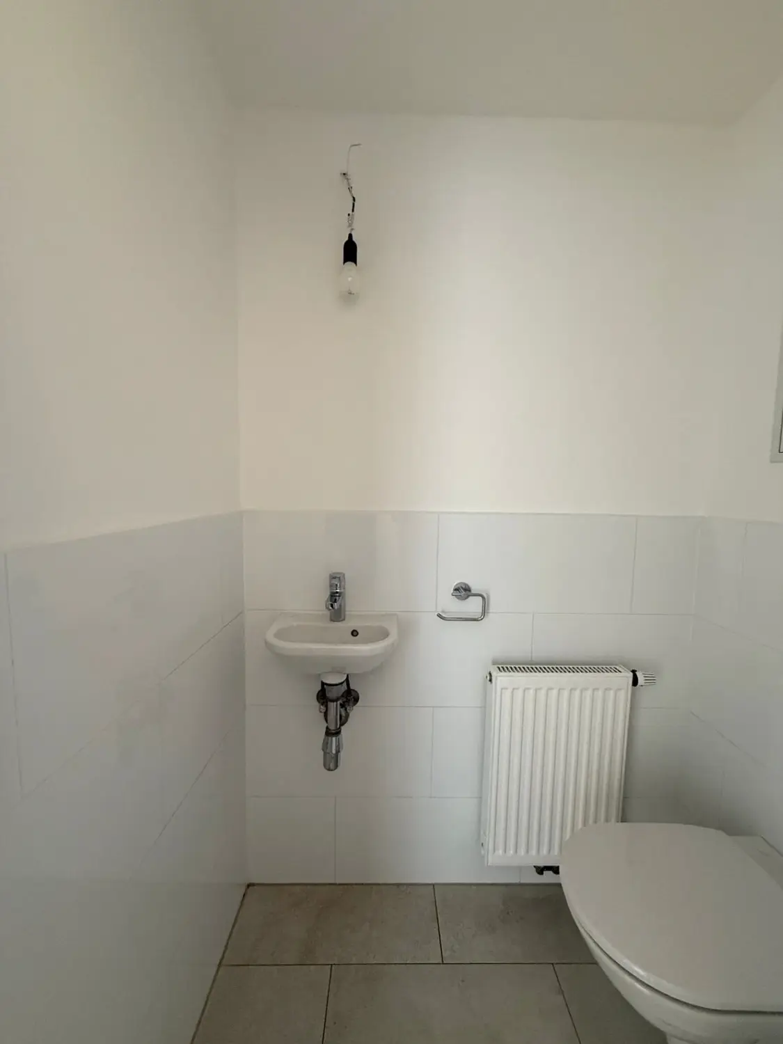 Sonnendeck-Terrasse im Innenhof, schön aufgeteilte 2-Zimmer Neubauwohnung