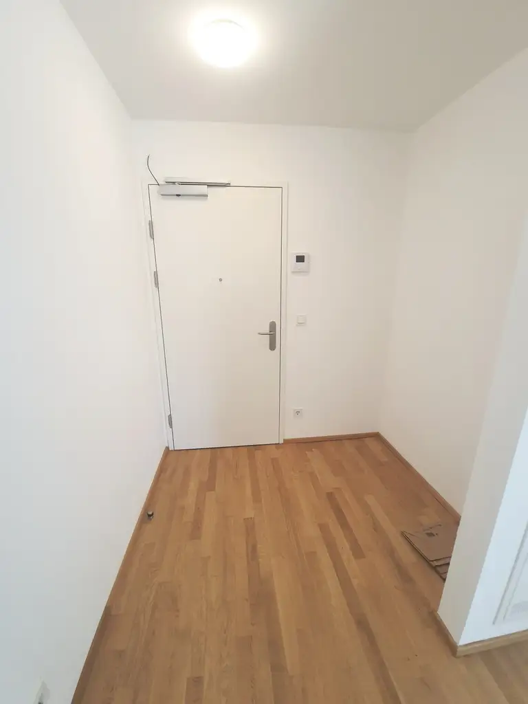 Neubauwohnung mit 2 Zimmern und Balkon im Laend Yard