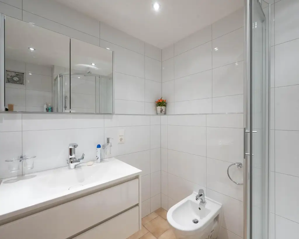 Attraktive Doppelhaushälfte mit sonnigem Wintergarten in ruhiger Lage