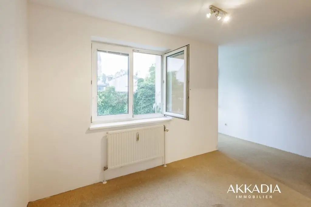 Ruhige 2-Zimmer-Wohnung mit Gartenblick und Garagenplatz