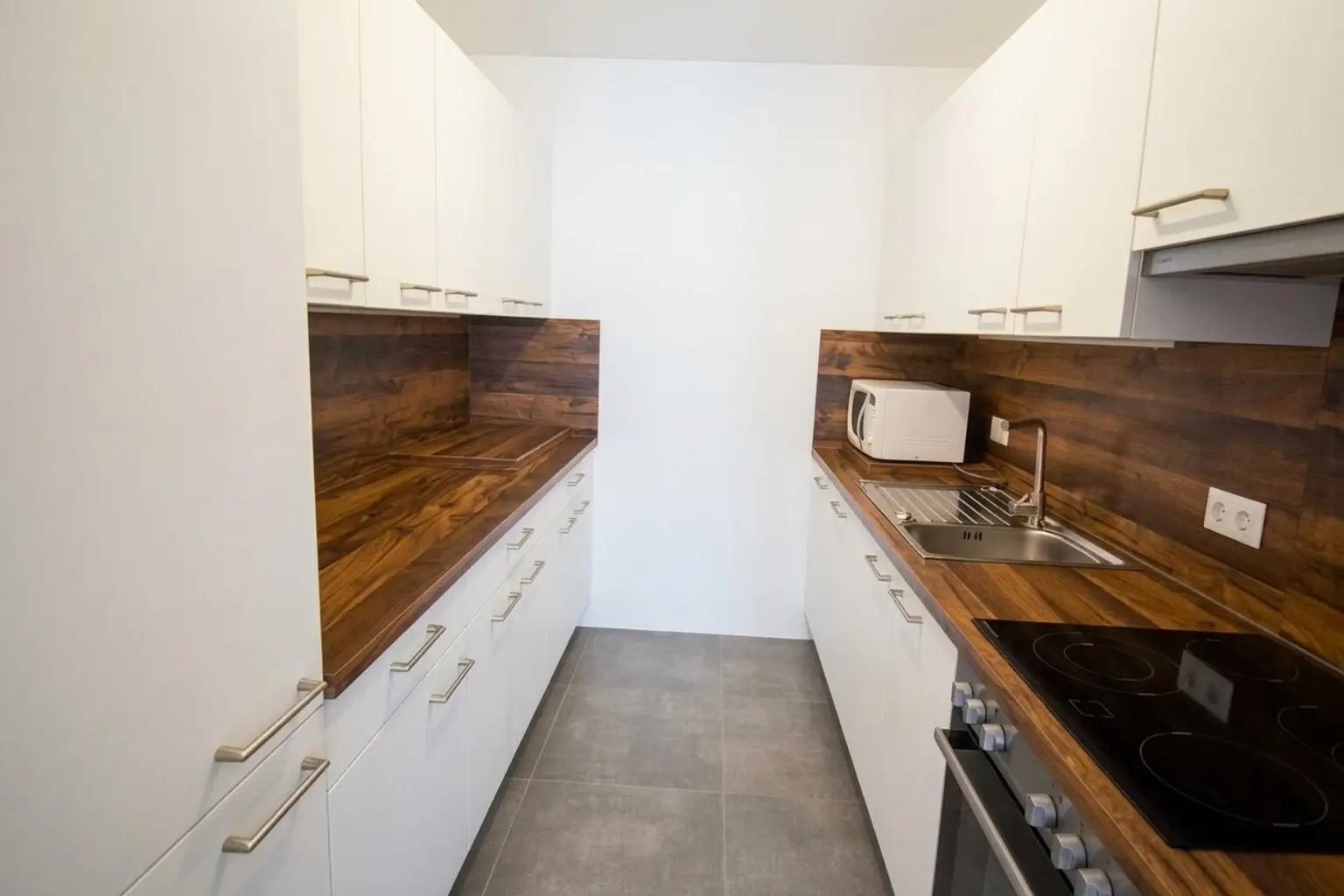 Moderne 2-Zimmer-Gartenwohnung mit Terrasse & Carport in begehrter Ruhelage