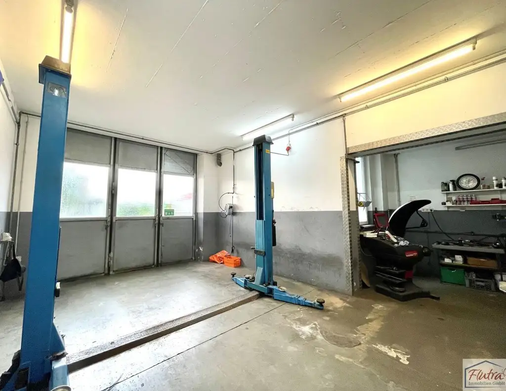 Attraktives Renditeobjekt: Wohn- und Geschäftshaus in Buchkirchen mit Garten und Pool!