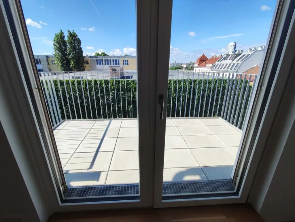 NEUBAU DACHGESCHOß-3-Zimmer-ERSTBEZUG mit Balkon in 1210 Wien! Top 2/50