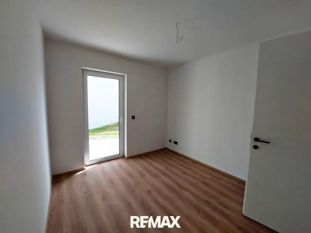 Erstbezug -Gartenwohnung! 3 Zimmer mit 2 Balkonen & großem Privatgarten