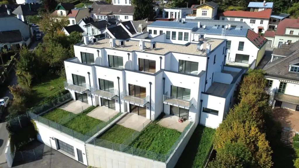 LEBENSQUALITÄT MIT AUSSICHT - EXKLUSIVES TOWNHAUS AUF EIGENGRUND IN WEIDLING – NATURNAHES WOHNEN MIT STIL