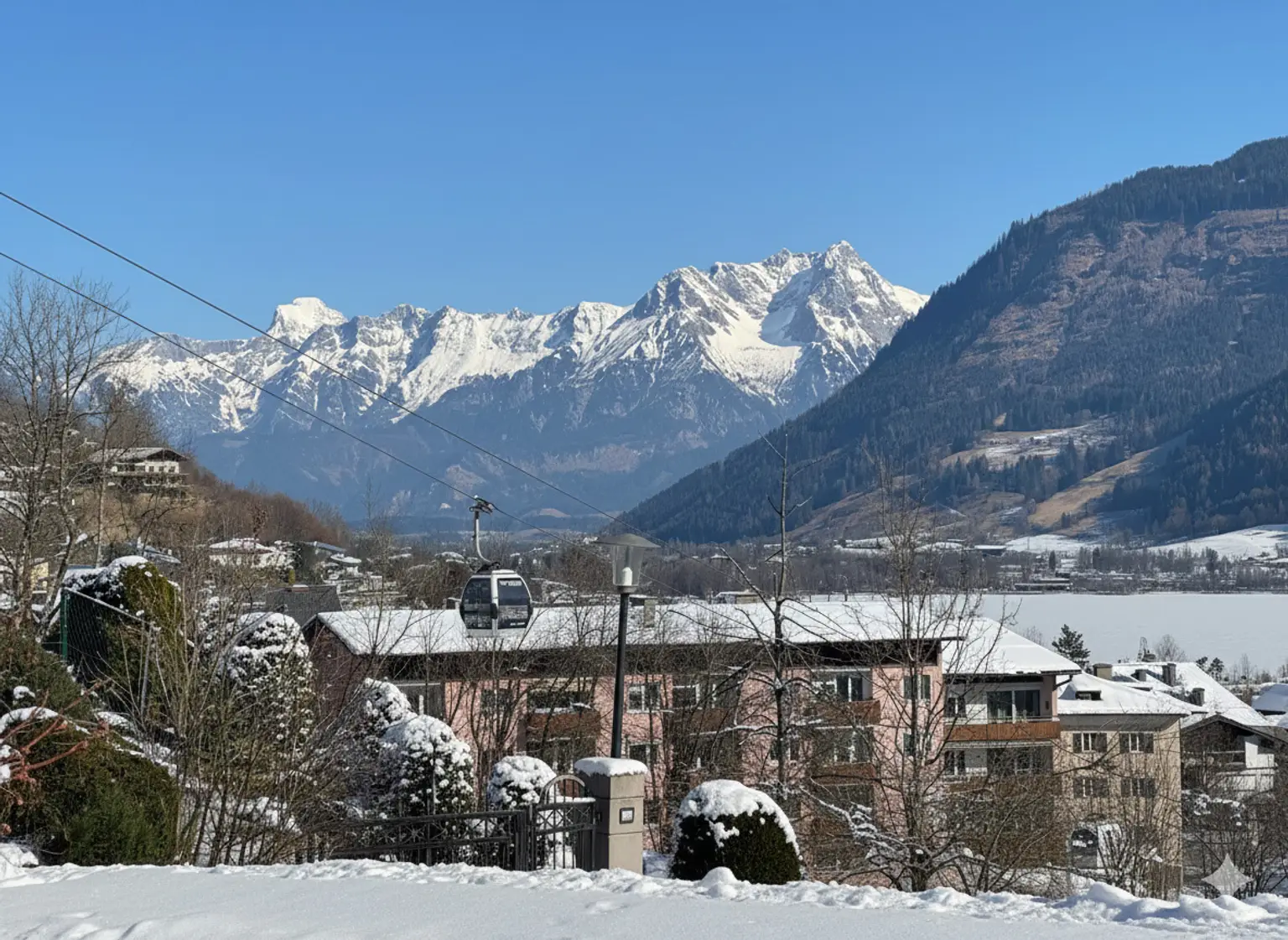 Traumhafte Gartenwohnung in Zell am See mit herrlichem Seeblick, Ski in Ski out!