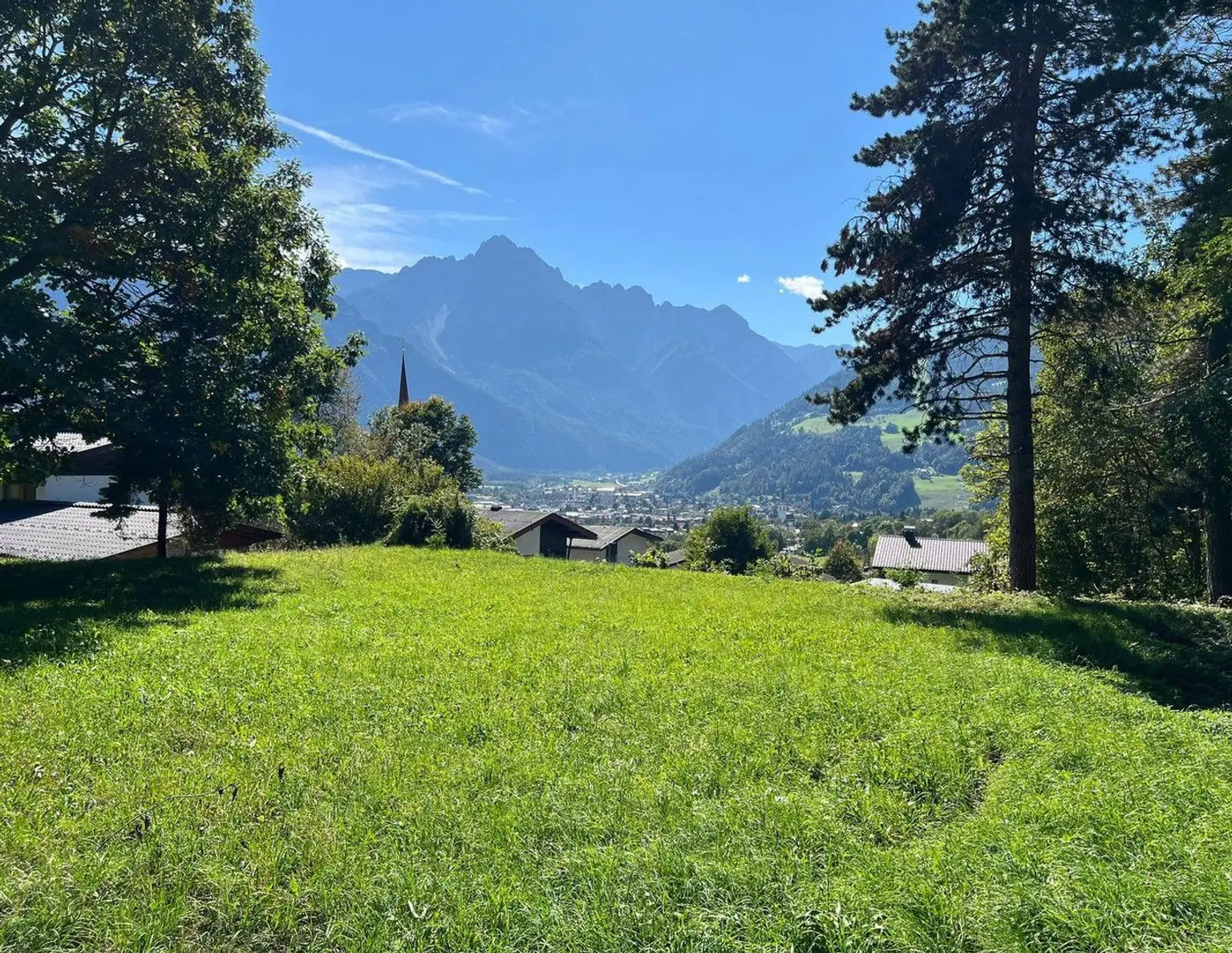 Sonniges Baugrundstück mit Dolomitenblick - Wohnen in Bestlage bei Lienz (Tirol)