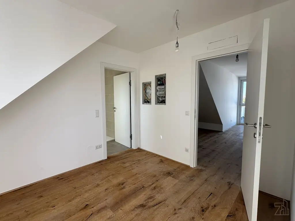 Helle Dachgeschoßwohnung mit südseitiger Terrasse & Grünblick | 2 Zimmer | ERSTBEZUG