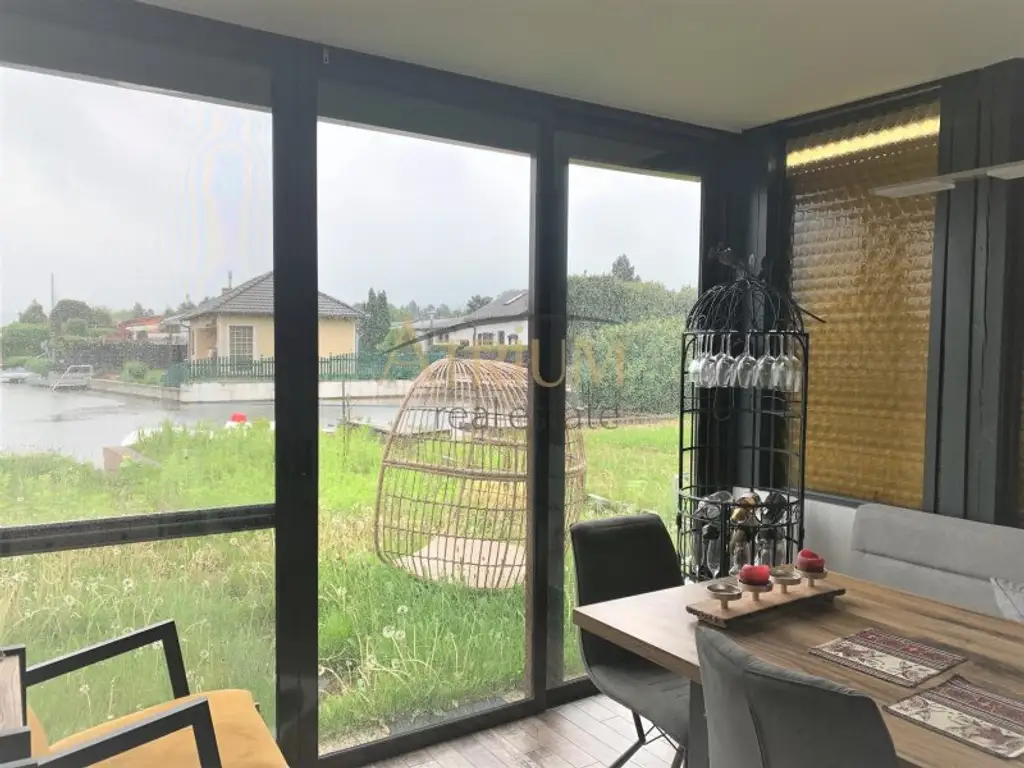 Wohnen mit Seeblick – Charmantes Haus auf Pachtgrund in 2451 Au am Leithaberge