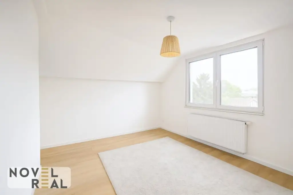 Lichtdurchflutete Dachgeschosswohnung mit großer Terrasse zum Verlieben