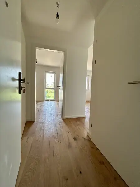 Erstbezug in Mannswörth: Moderne 2-Zimmer Wohnung mit Balkon