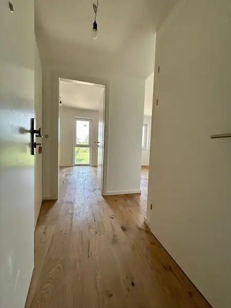Erstbezug in Mannswörth: Moderne 2-Zimmer Wohnung mit Balkon