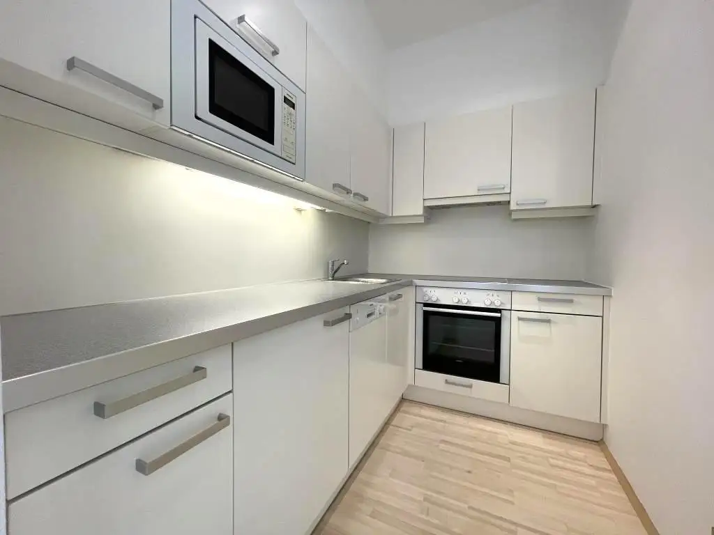 Erdgeschoß, barrierefrei, Innenhof! Ruhige, loft-artige Neubauwohnung mit 2 kl. Terrassen