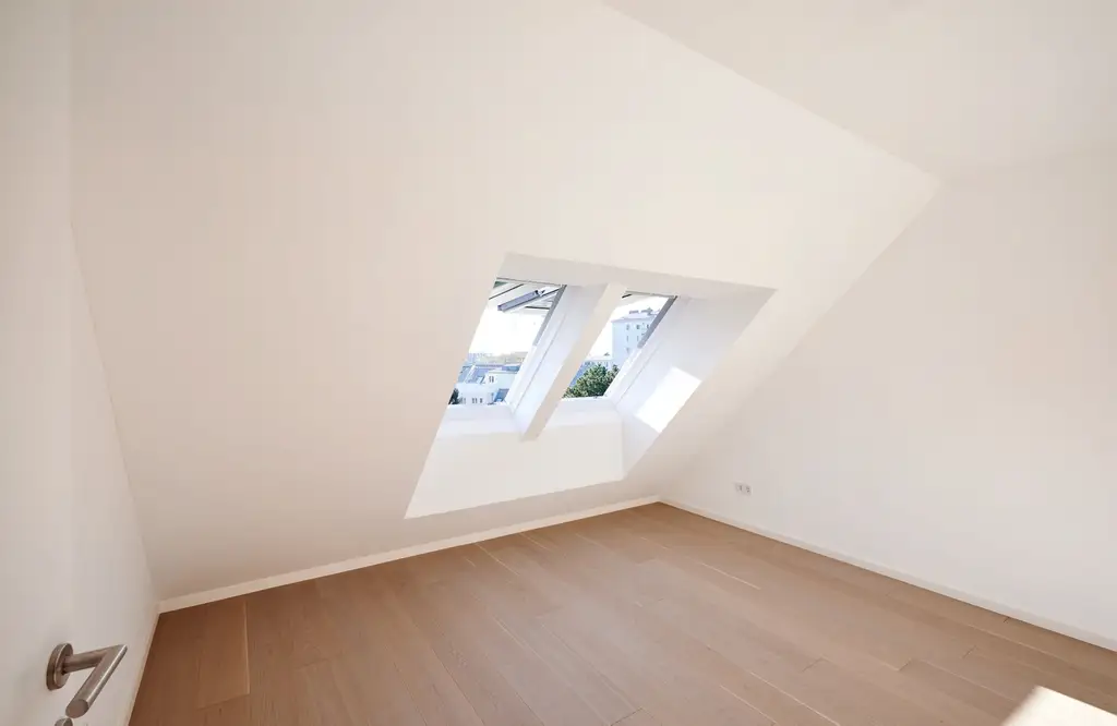 4-Zimmer-Dachgeschosswohnung mit Terrasse in idyllischer Grünlage 
nahe Donau - ERSTBEZUG!