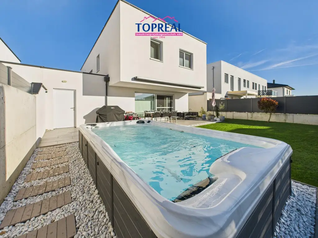 Exklusives Neubauhaus in Marchtrenk – stilvolles Wohnen mit modernster Technik & traumhaftem Garten samt Wellnessbereich