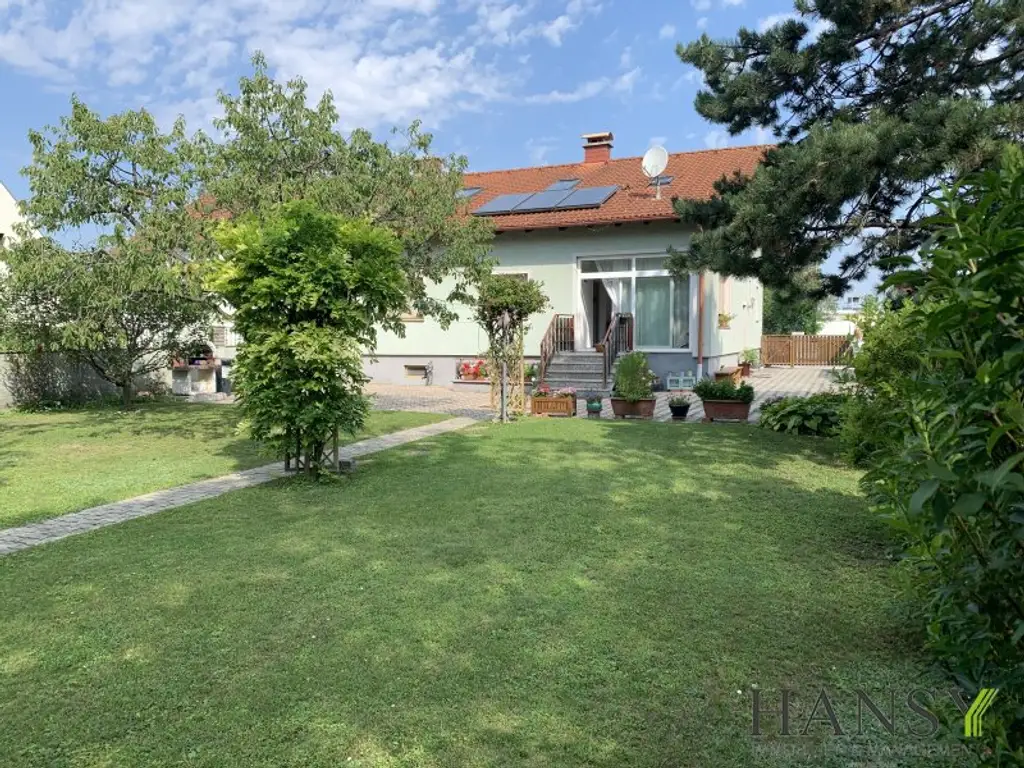 Großzügiges, bezugsfertiges Traumhaus mit Baugrund, Doppelgarage und Gartenidylle