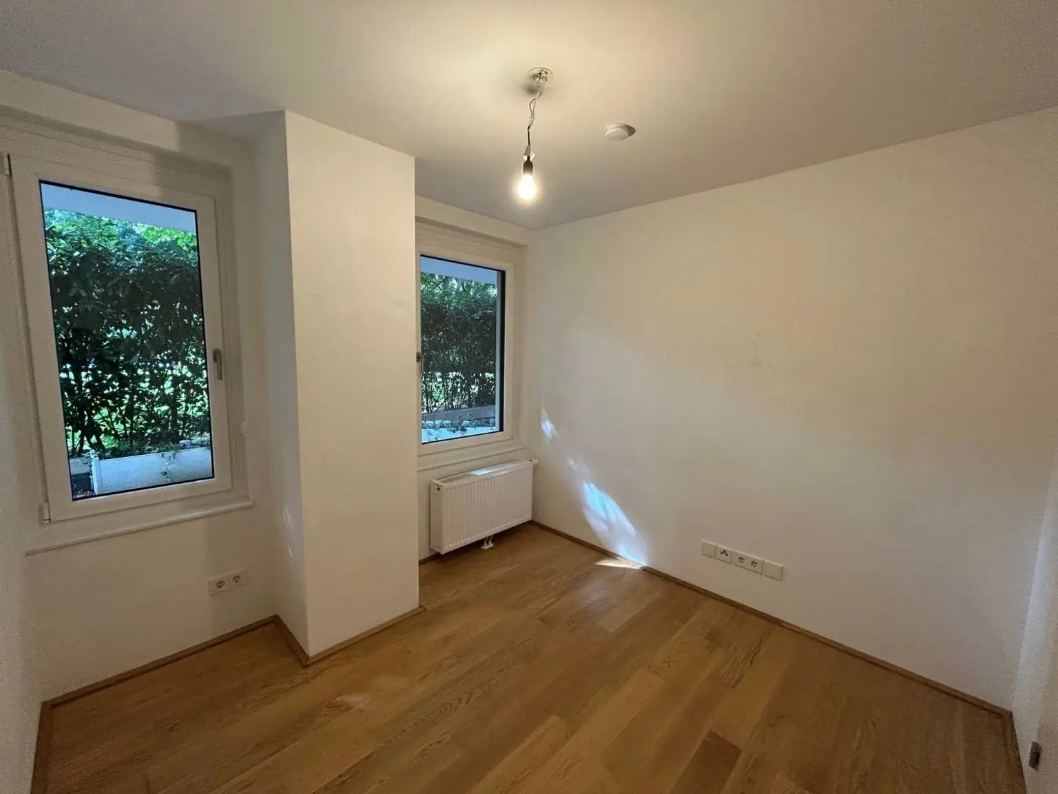 Moderne 4-Zimmer-Gartenwohnung mit Terrasse und Garagenplatz