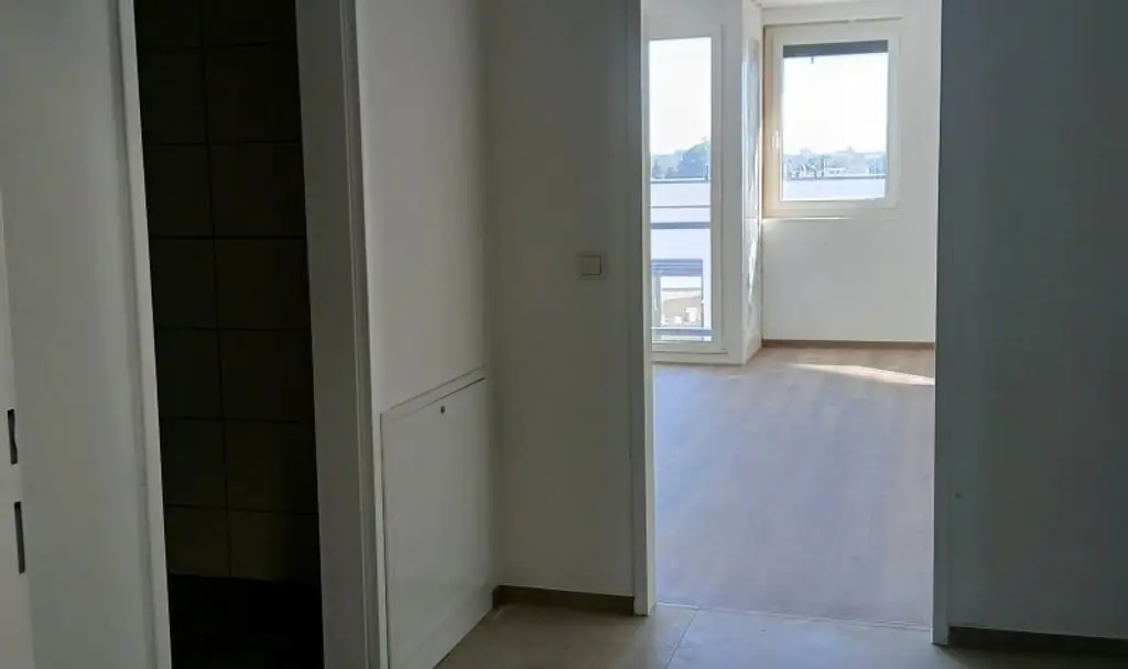Top 2.2 - NEUBAU - ERSTBEZUG - Garconniere ( 1 Zimmerwohnung ) mit Loggia und eigenem Tiefgaragenplatz