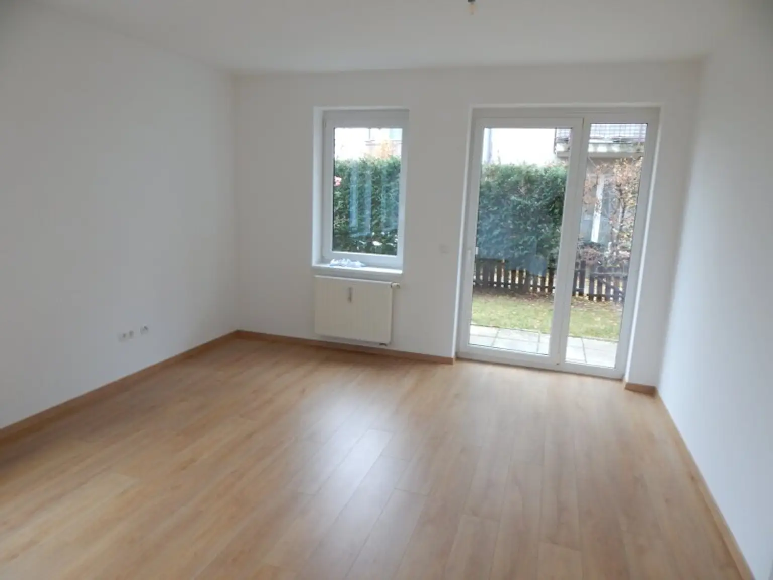 "PROVISIONSFREI" Helle und ruhige Garten-/Terrassenwohnung mit Tiefgaragenplatz