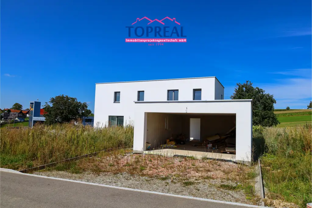 Neubau-Einfamilienhaus in St. Roman – modernes Wohnen mit offenem Design & Südwestgarten