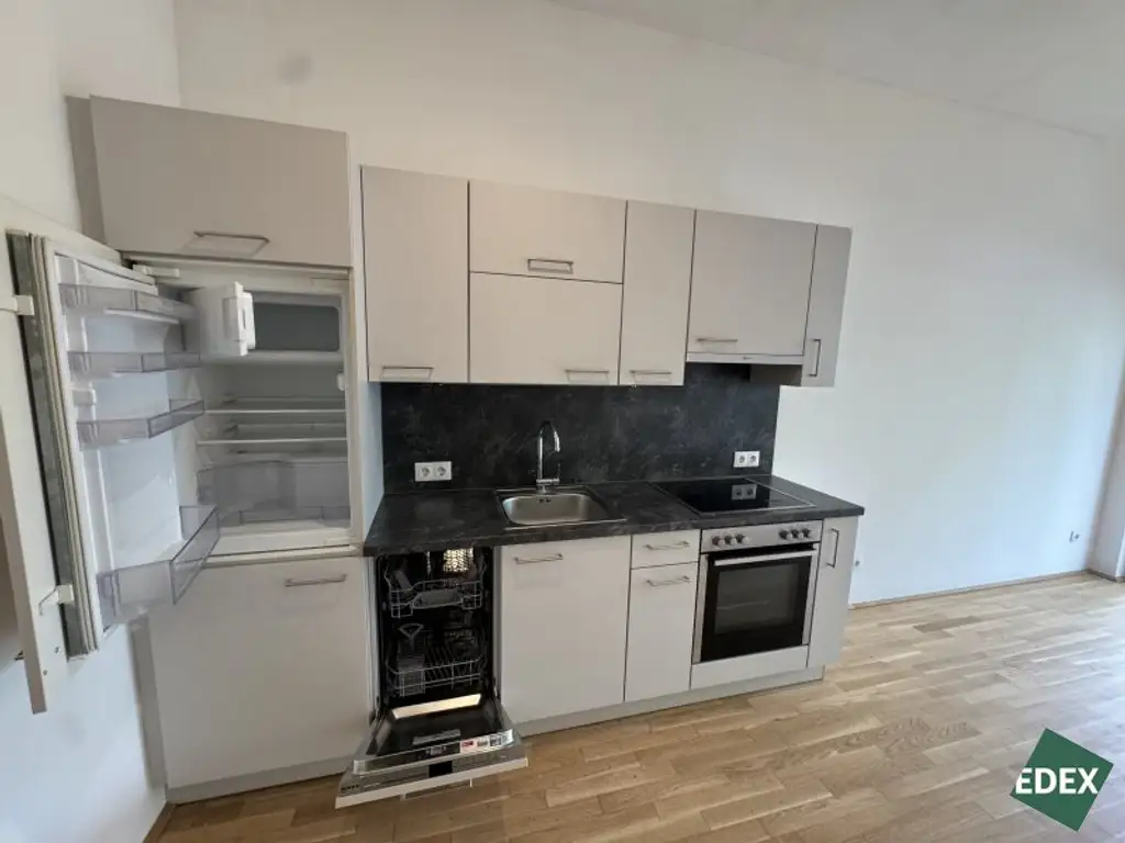 Ab sofort: Moderne 2-Zimmer-Wohnung mit Terrasse und Garten nahe U1