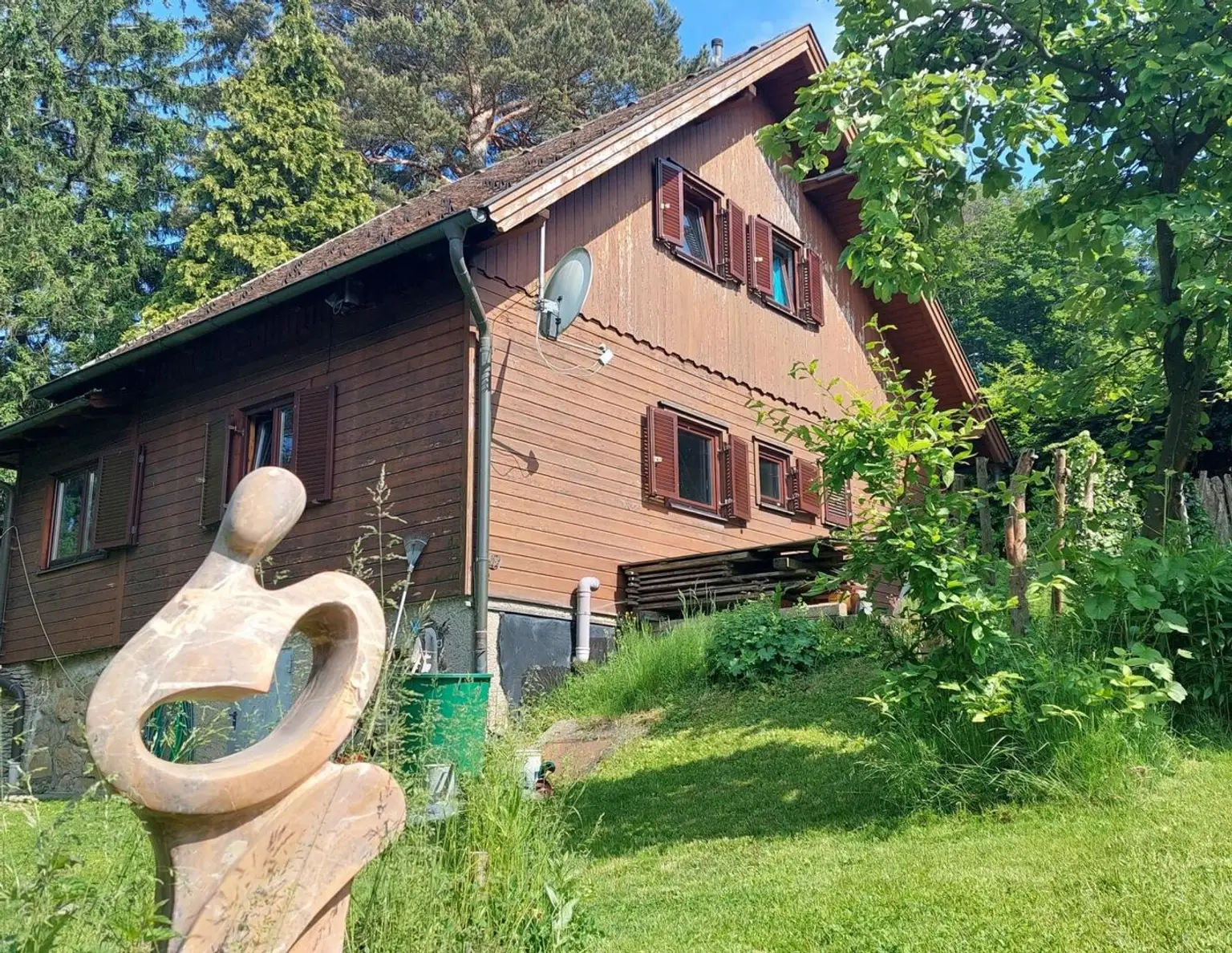 NEUER PREIS! Ausbaufähiges Holzhaus in Grünlage!