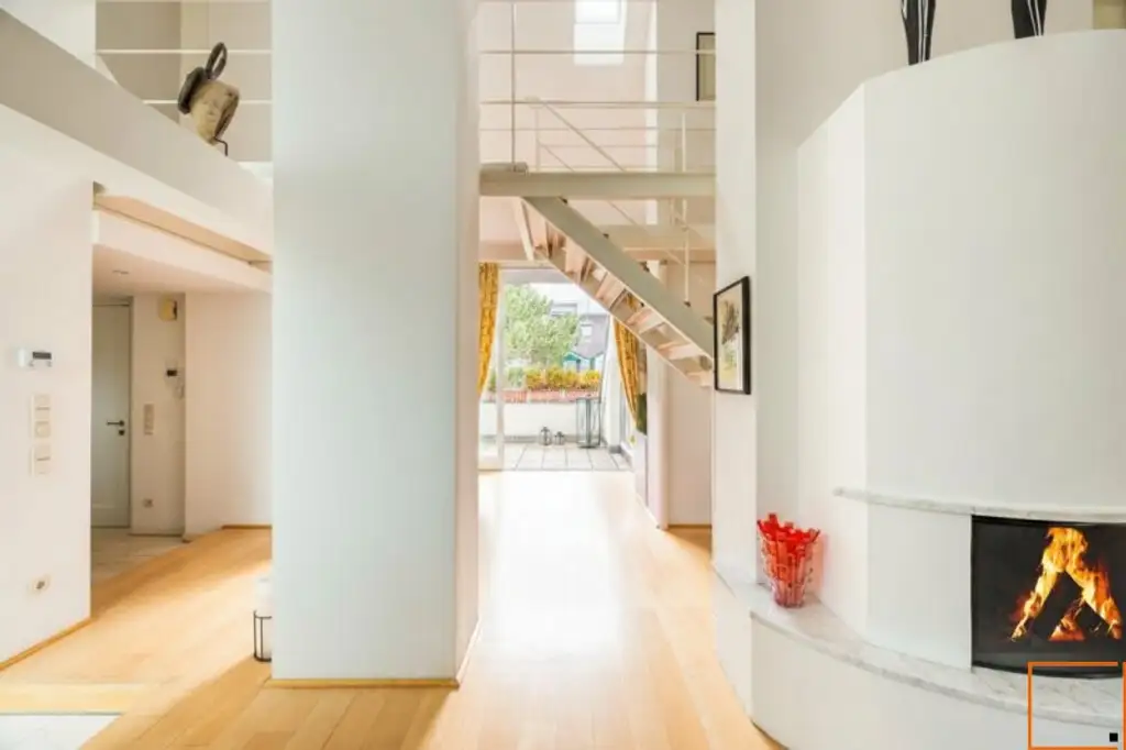 Luftiges Familien-Penthouse mit Ateliercharakter, großen Terrassen und Grünblick