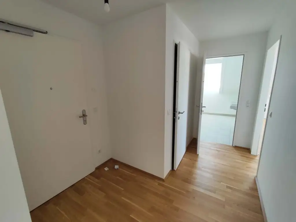 NEUBAU DACHGESCHOß-3-Zimmer-ERSTBEZUG mit Balkon in 1210 Wien! Top 2/43