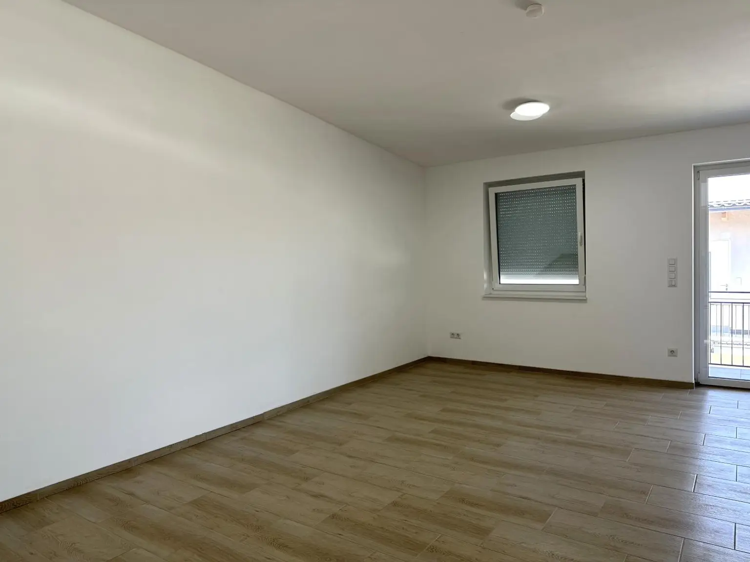 Exklusiv wohnen im Grünen – 4-Zimmer-Neubauwohnung mit Balkon zu kaufen