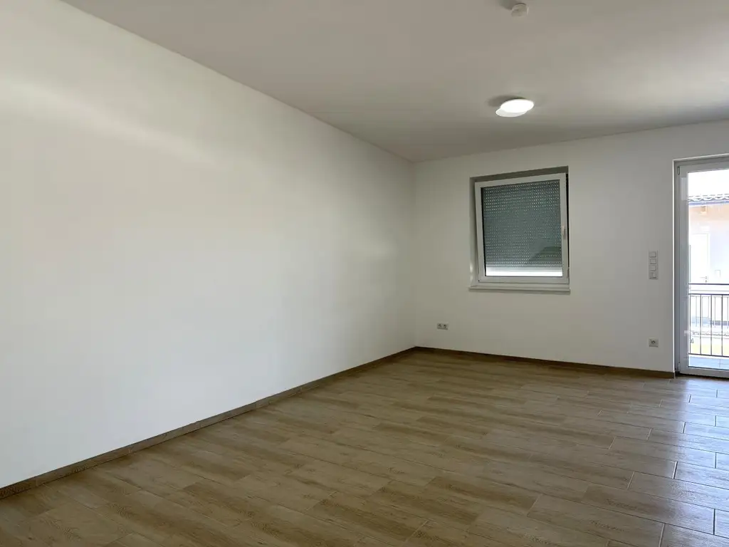Exklusiv wohnen im Grünen – 4-Zimmer-Neubauwohnung mit Balkon zu kaufen