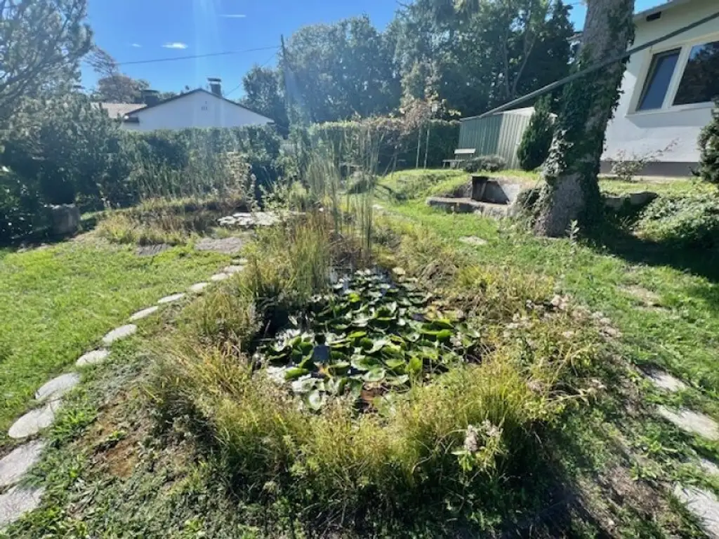 Seeblick inklusive! Bungalow mit 3 Schlafzimmern und charmantem Garten- mit Erweiterungsmöglichkeit!