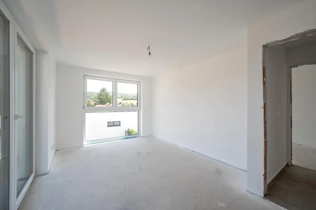 Erstbezug: Großzügiger Familientraum mit unverbaubarem Grünblick!